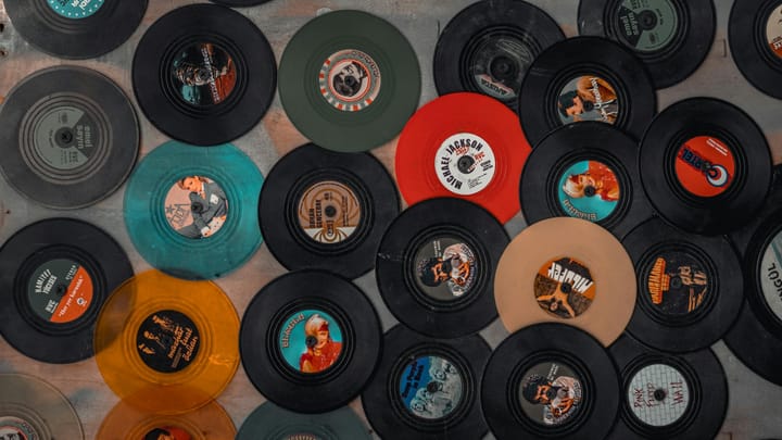 An assortment of small vinyl records.